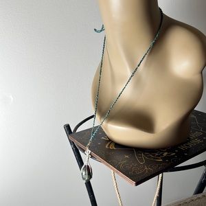 #7 Dragons blood stone Egg Necklace wire wrapped in silvertone with green cord